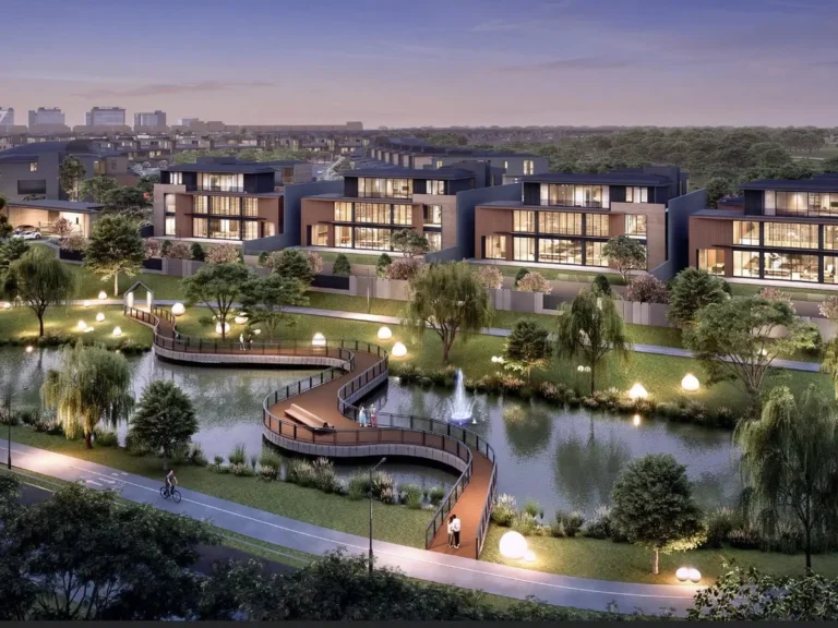 Island Villa di NavaPark BSD City dengan danau dan jembatan kayu